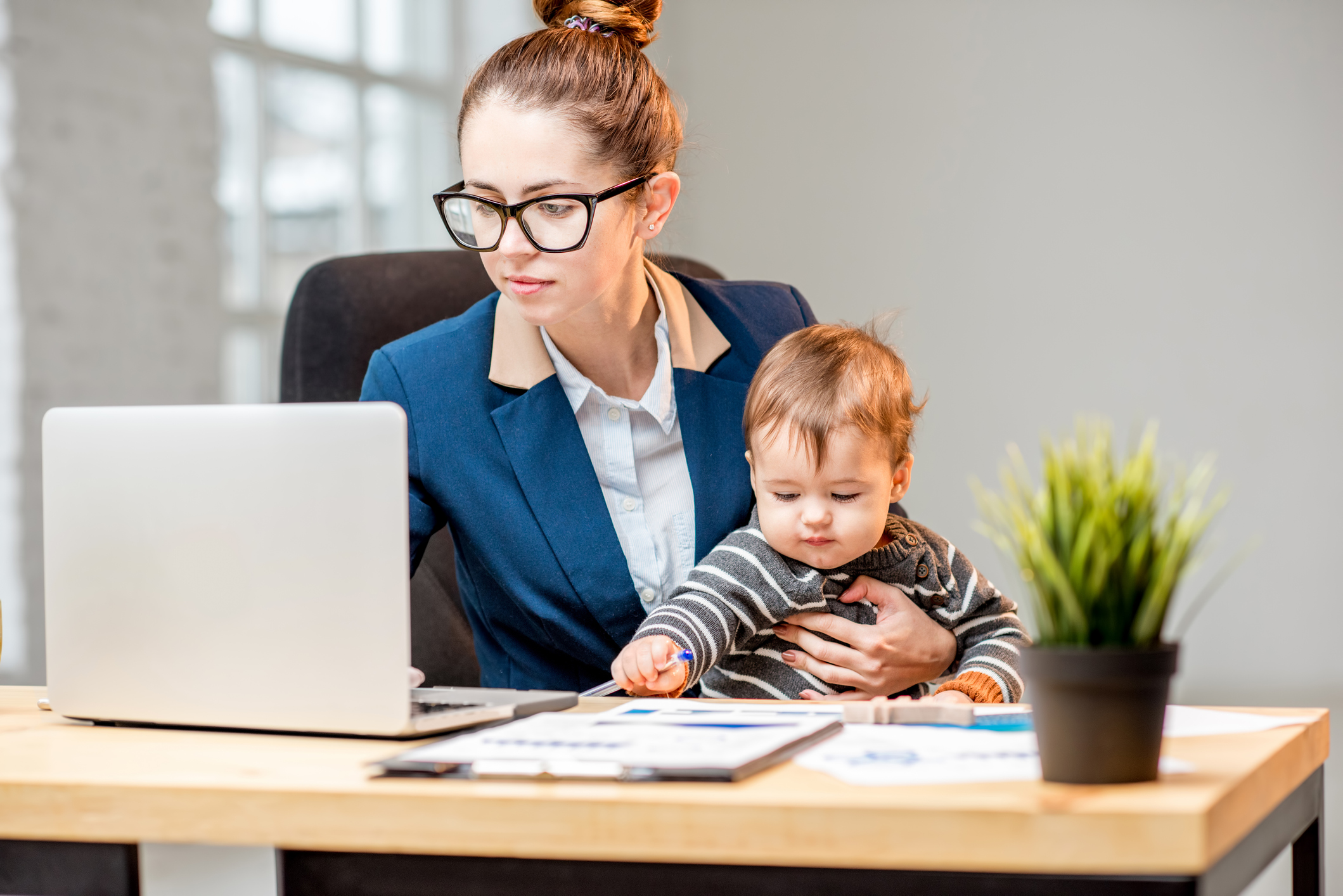Working mom in office