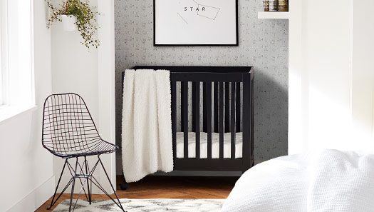 Pottery Barn Babyletto Mini Crib perefct for small apartment living!