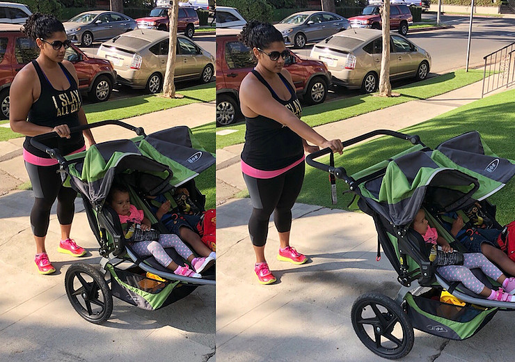 Woman demonstrating single arm chest press with stroller.